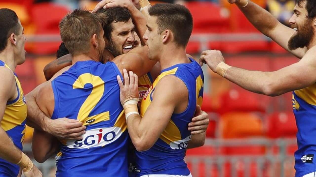 Jack Darling of the Eagles celebrates with teammates.