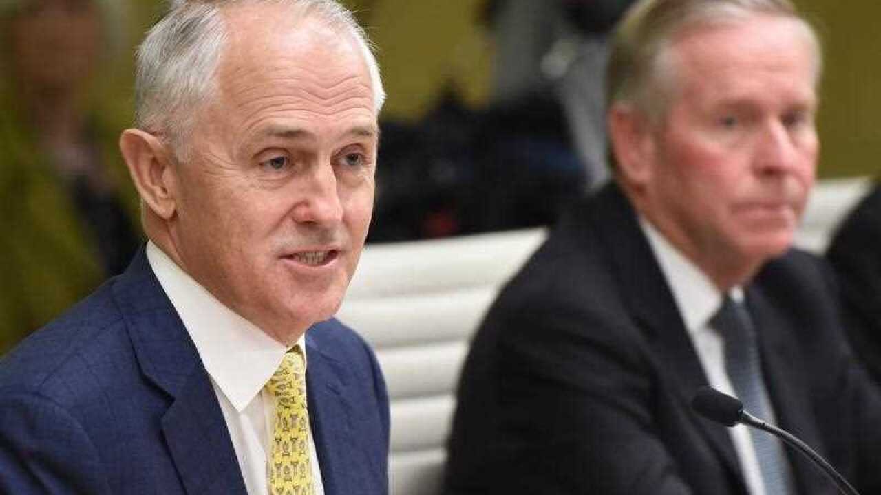 Prime Minister Malcolm Turnbull (left) with Western Australian Premier Colin Barnett (right) during the Council of Australian Governments meeting in Sydney.
