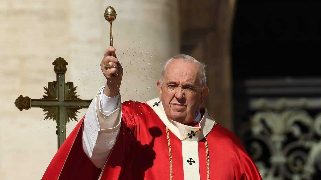 A pope leads a mass service.