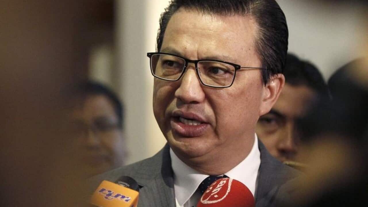 Malaysian Transport Minister Liow Tiong Lai speaks to journalists