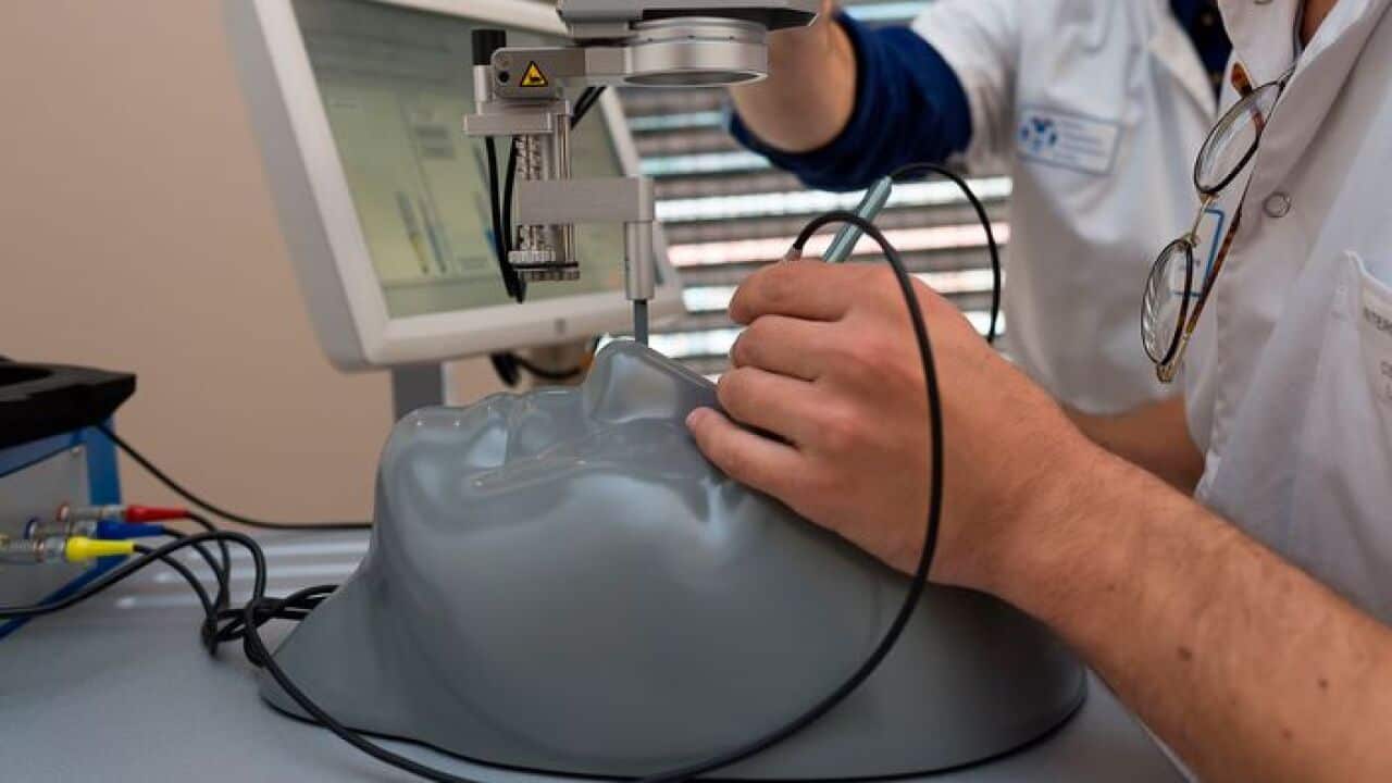 A simulation centre in France allows interns to practice eye surgery techniques on a mannequin.