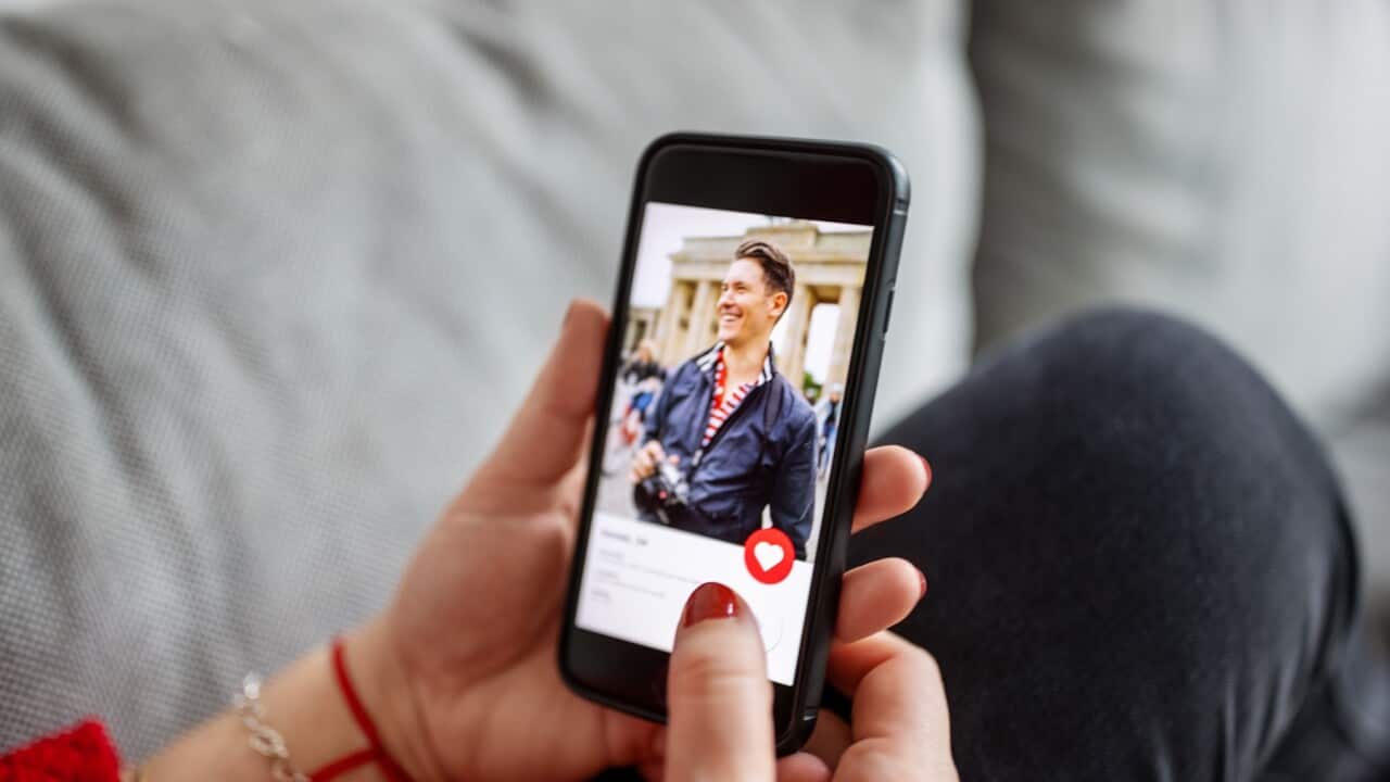 Female using a dating app on smart phone