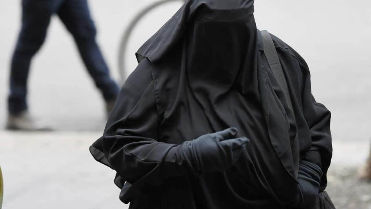 Moutia Elzahed arrives to the Downing Centre court