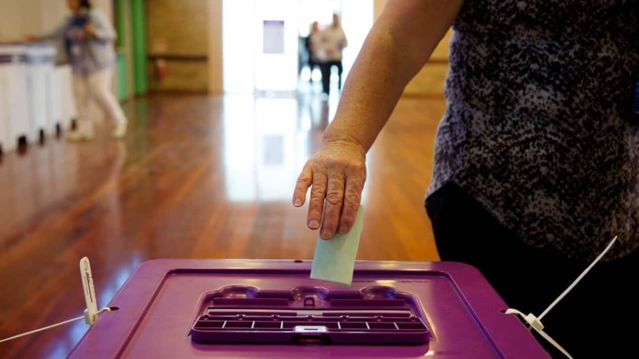 Voters posting their votes at Byford North polling station on election day during the Canning by election, Western Australia, Byford, Western Australia, Saturday Sept. 19, 2015. (AAP Image/Richard Wainwright) NO ARCHIVING