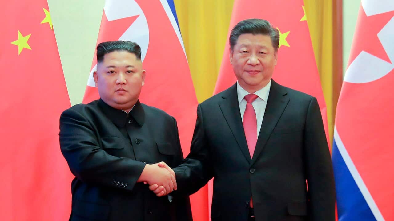 Kim Jong Un and President Xi Jinping