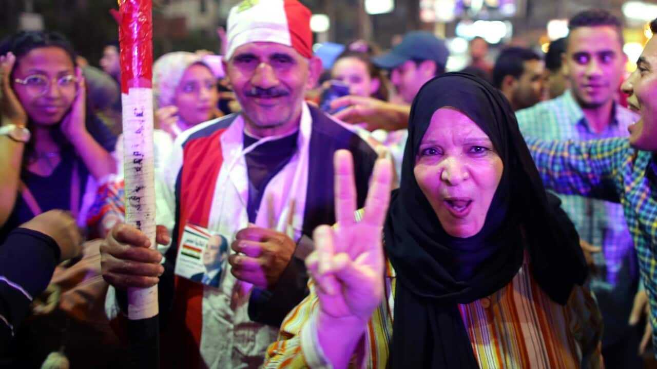 Supporters of Egyptian President Abdel Fattah al-Sisi celebrate in Heliopolis after the presidential election results were announced, in Cairo, Egypt
