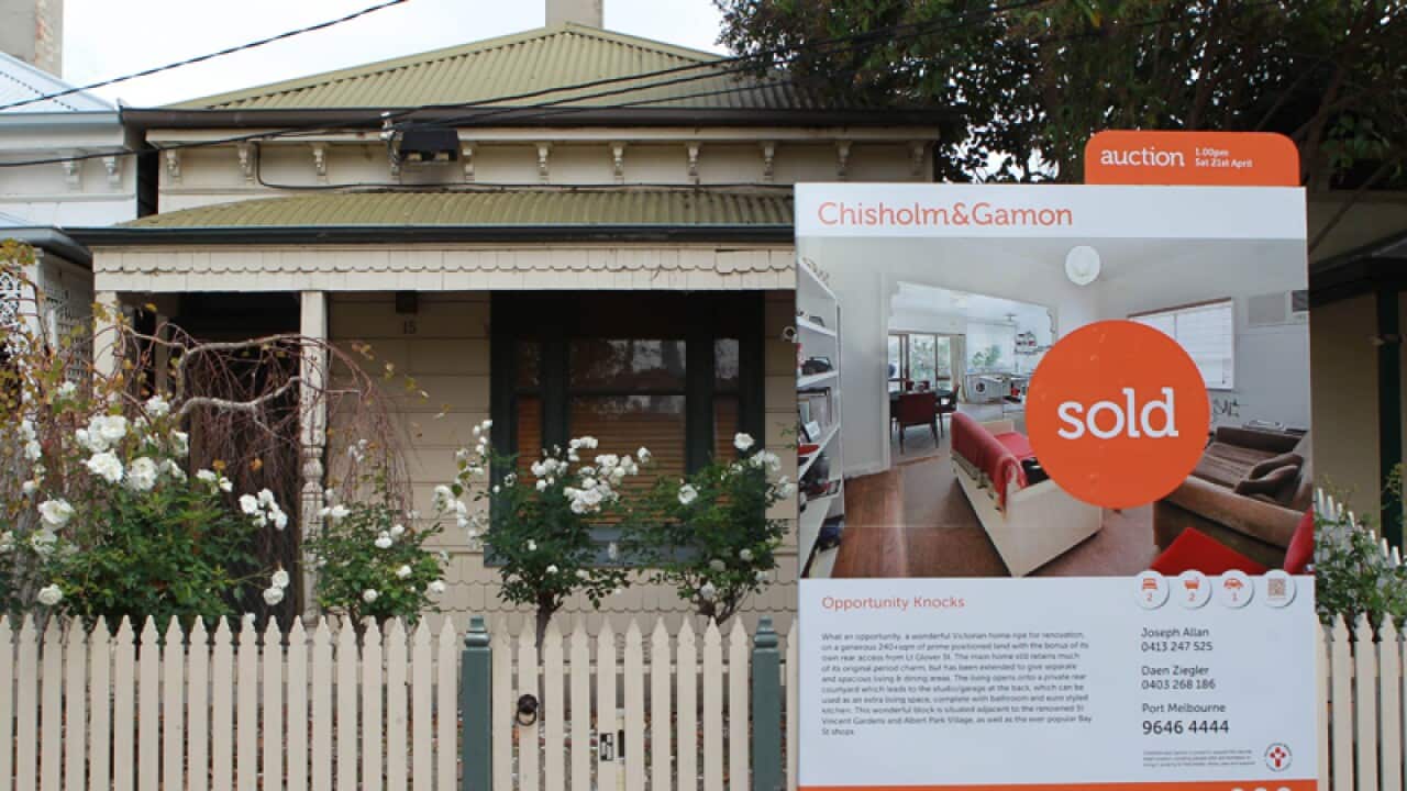 A sold sign on a house in Melbourne