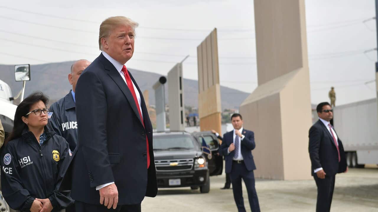 US President Donald Trump inspects border wall prototypes in San Diego, California.
