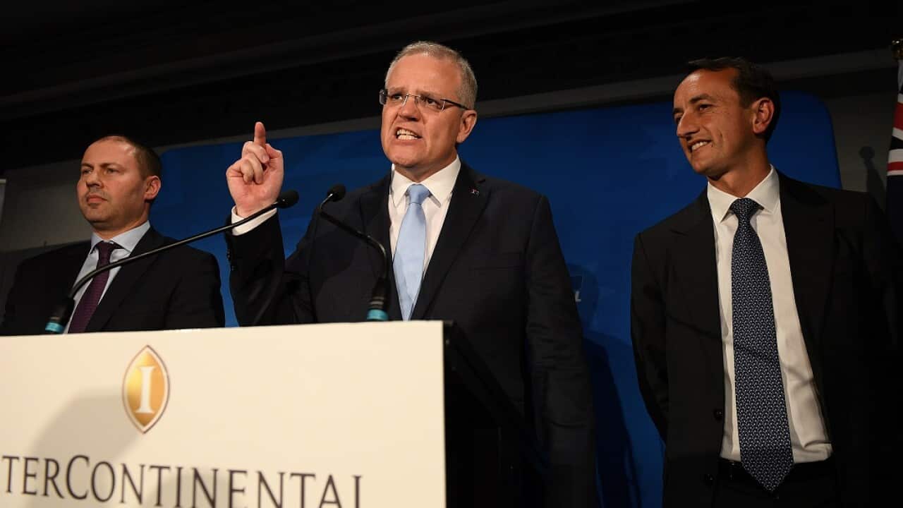 Australian Prime Minister Scott Morrison along with treasurer Josh Frydenberg and Liberal candidate Dave Sharma.