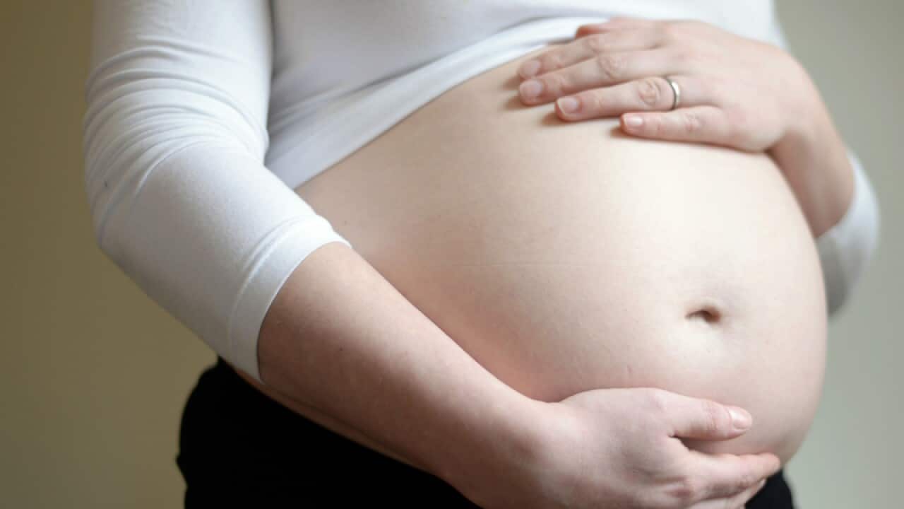 File: A pregnant woman.