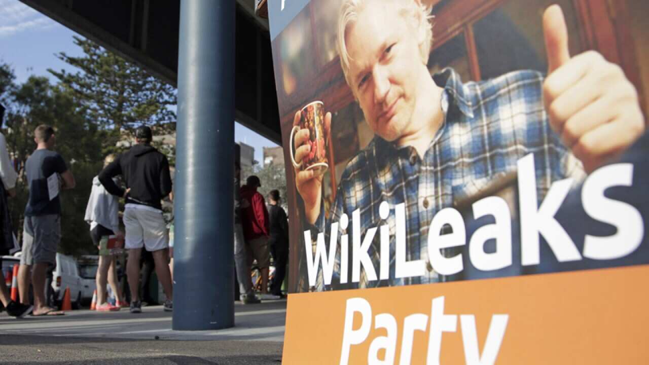 A placard showing WikiLeaks founder Julian Assange