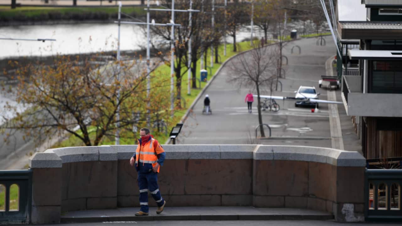 A man is seen wearing a face mask in Melbourne, Thursday, July 23, 2020