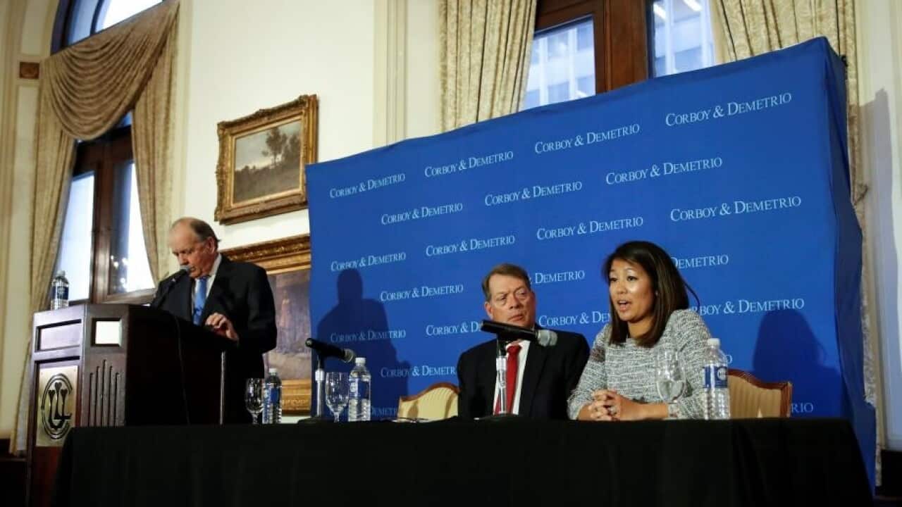 Crystal Dao Pepper, daughter of Dr. David Dao, speaks during a news conference in Chicago