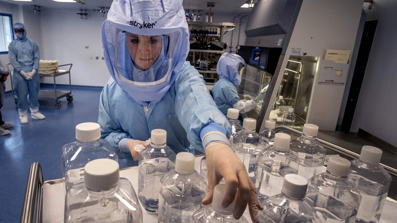 A laboratory worker involved in the production of the Pfizer/BioNTech coronavirus in Marburg, Germany.
