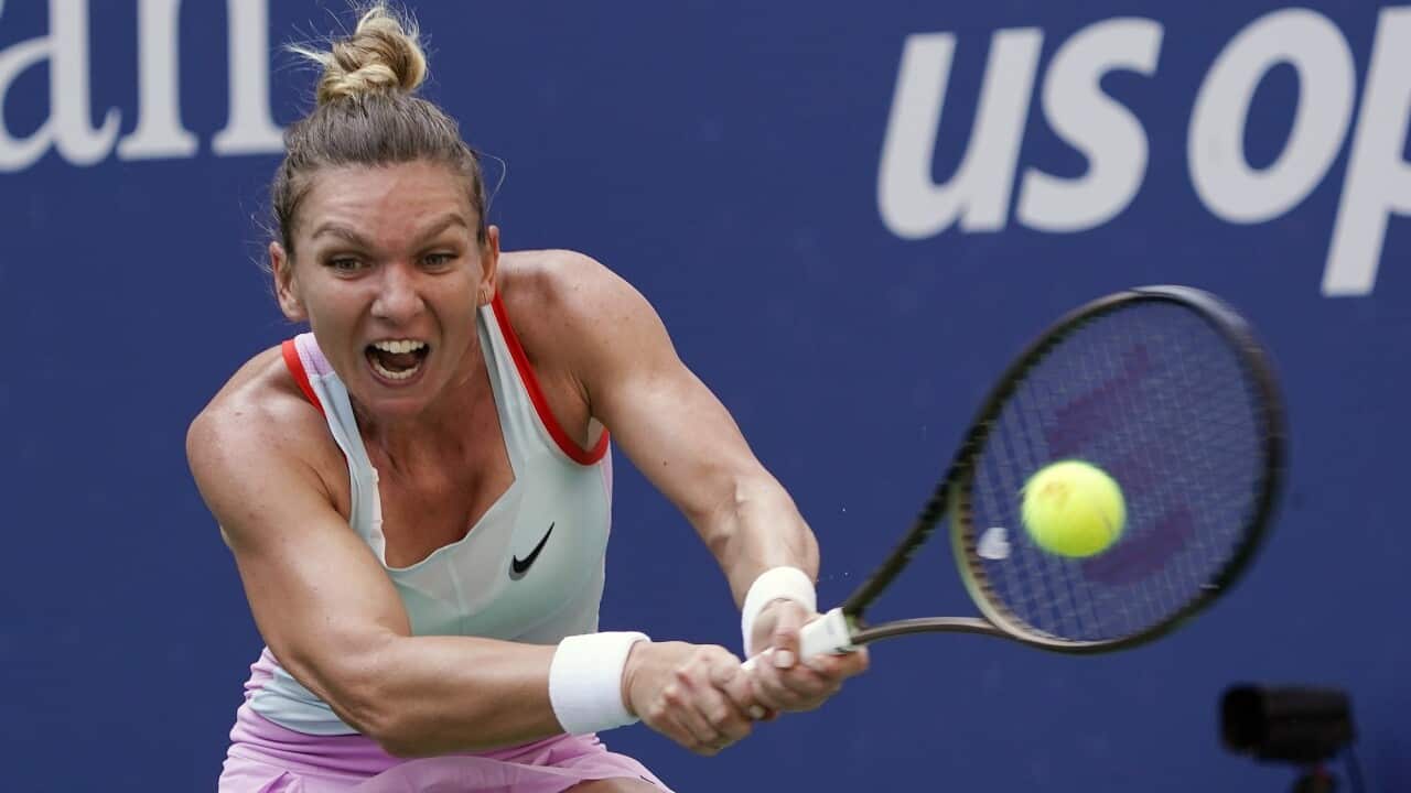 Simona Halep returns a shot to Daria Snigur during the first round of the US Open tennis championships on 29 August 2022 in New York.