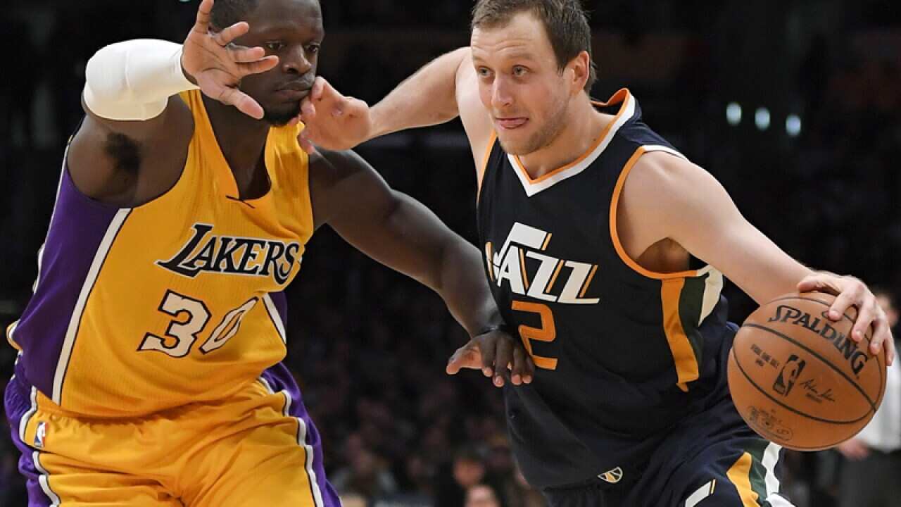 Australia's Utah Jazz star Joe Ingles (R)