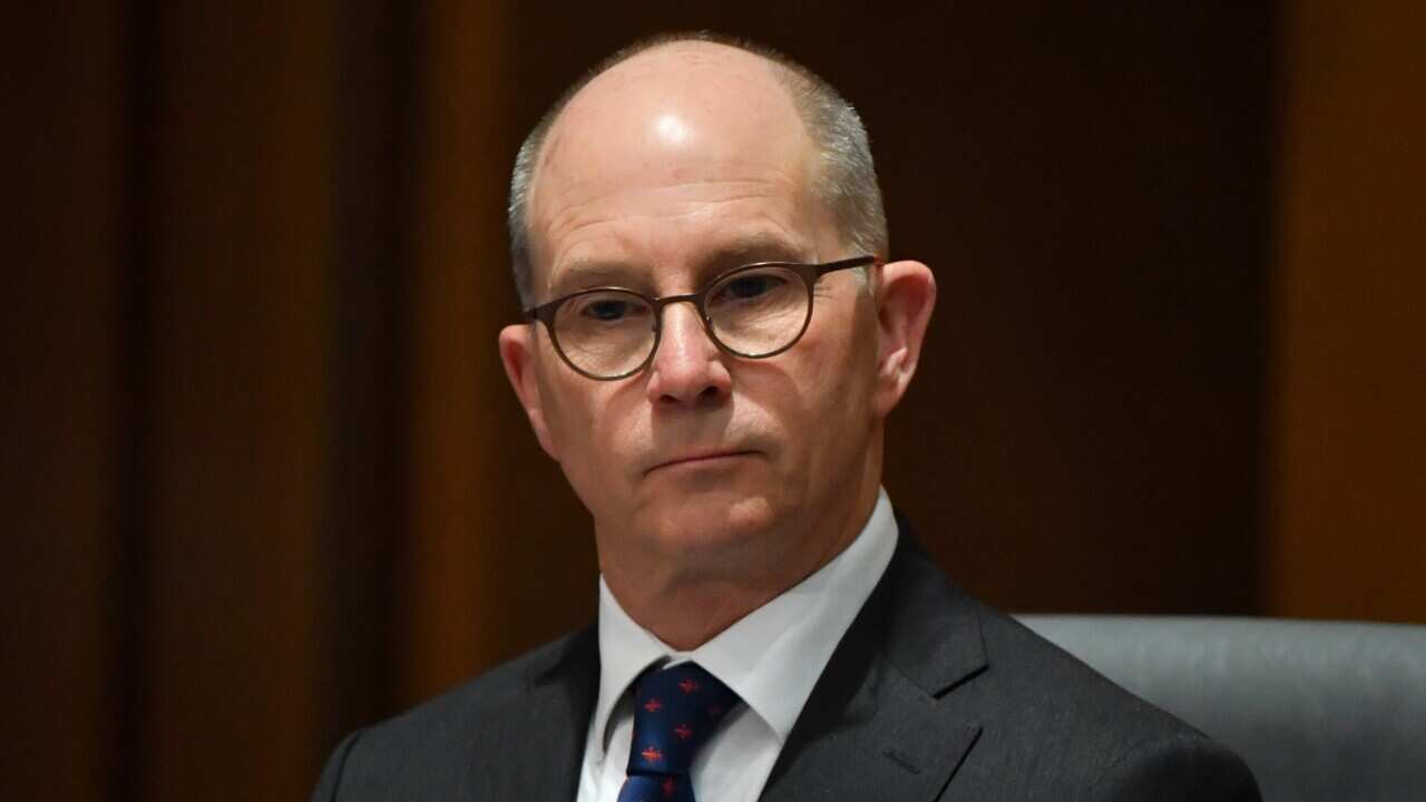 Acting Chief Medical Officer Paul Kelly at a press conference at Parliament House in Canberra, on 11 December.