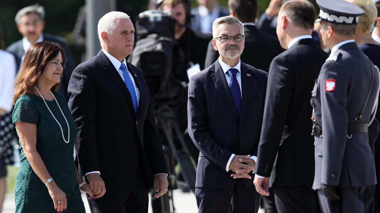US Vice-President Mike Pence and and his wife Karen arrive for the ceremony marking 80th anniversary of World War II