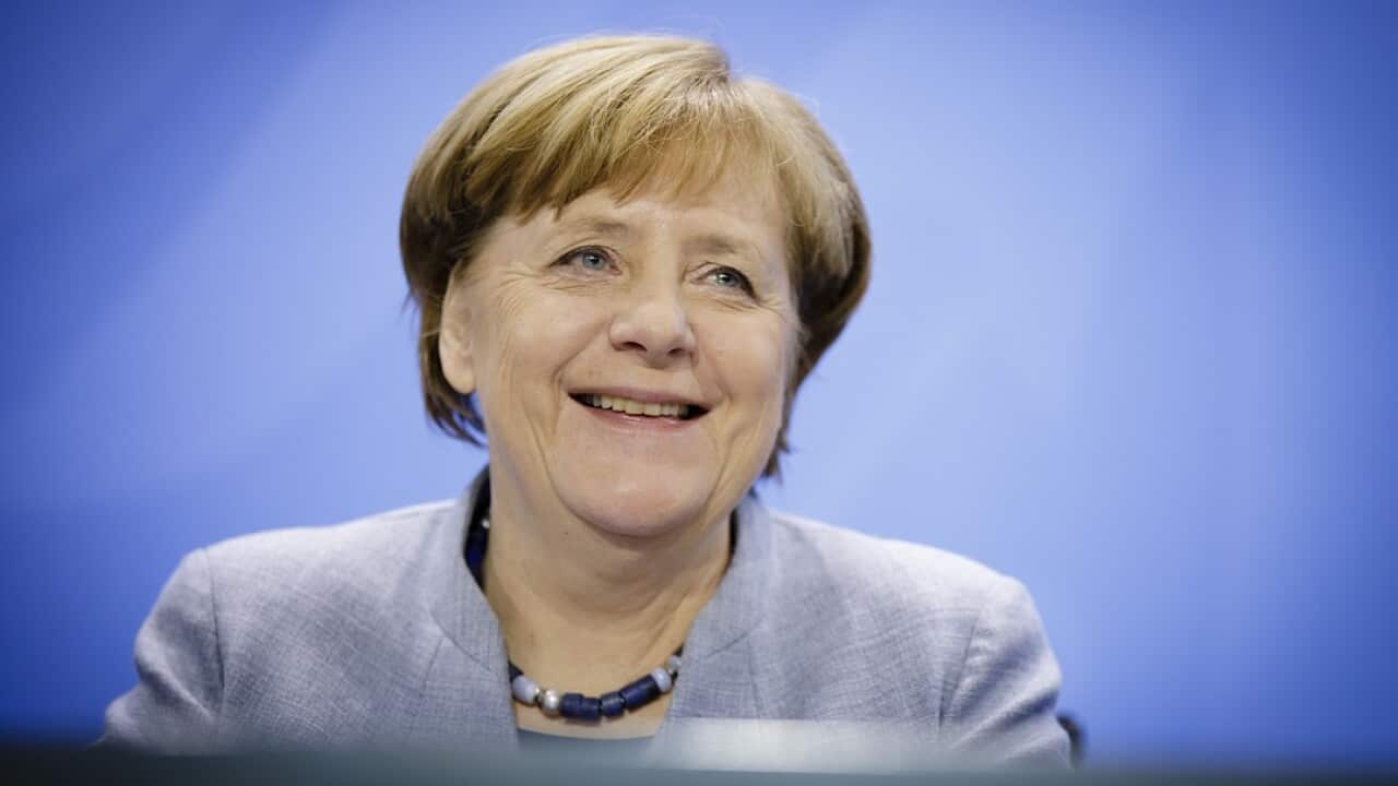 Angela Merkel has reportedly formed a new coalition.
