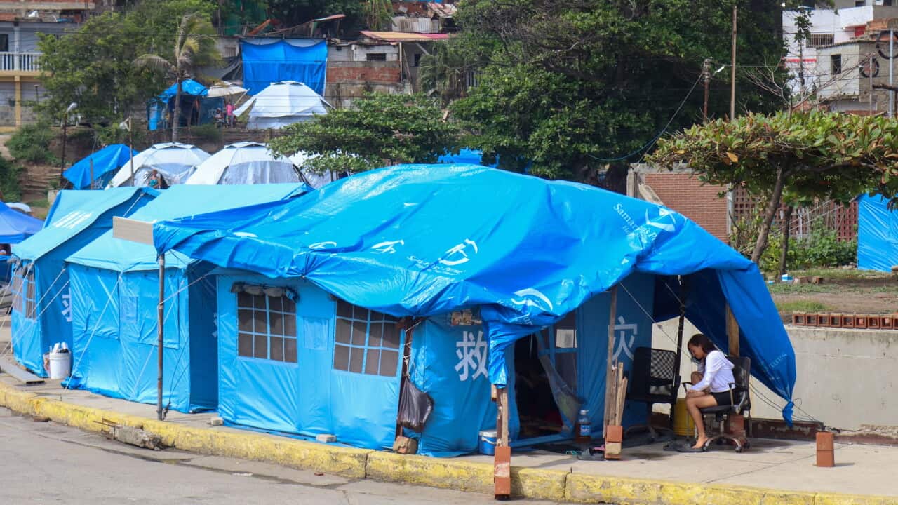 Displaced families remain in temporary shelters in La Guaira