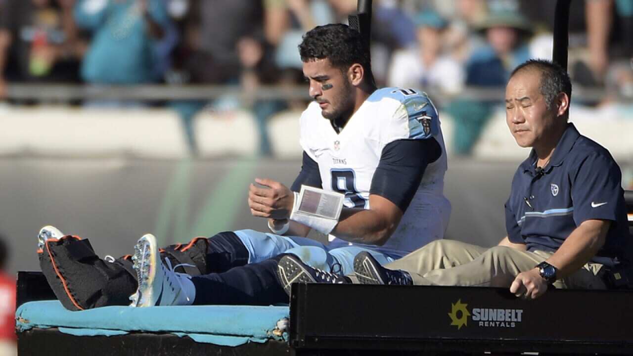 Tennessee Titans quarterback Marcus Mariota leaves the field