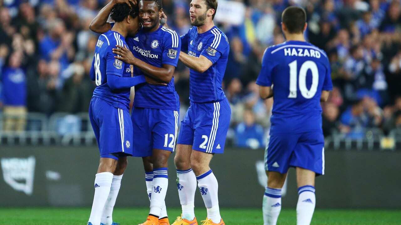 Loic Remy (left) laps up the accolades of his Chelsea teammates after his thumping winner against Sydney FC (Getty)