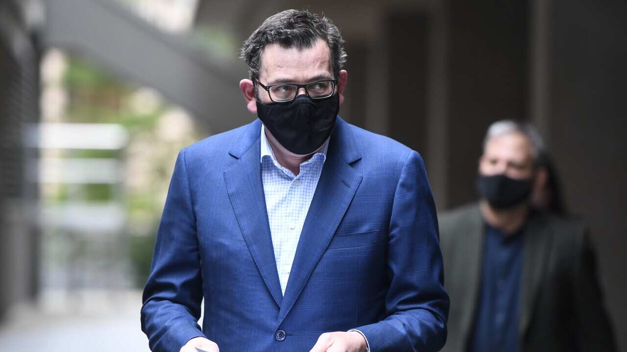 Victorian Premier Daniel Andrews arrives to a press conference in Melbourne, Sunday, August 16, 2020. Victoria has recorded 279 new coronavirus cases and 16 deaths, taking the national toll to 395. (AAP Image/Erik Anderson) NO ARCHIVING