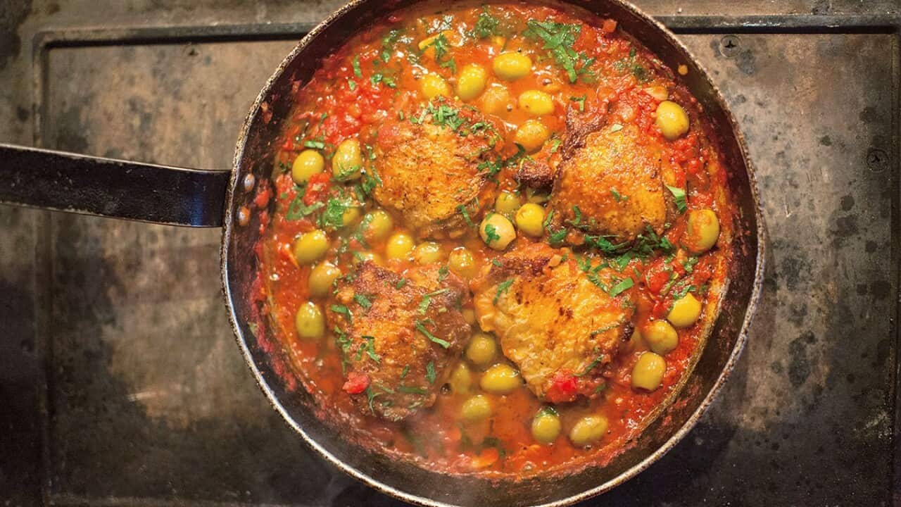 Chicken thighs in green olive and tomato sauce