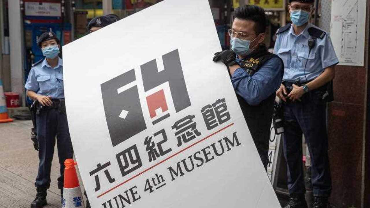 Police from the National Security Department load pieces of evidence gathered at the closed June 4th Museum into a truck in Hong Kong, China, 09 September 2021.
