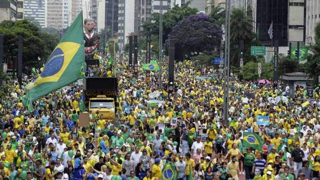 Protesters gather at the Paulista avenue in Sao Paulo, Brazil, on 13 March 2016, to demand the dismissal of Brazilian President Dilma Rousseff.