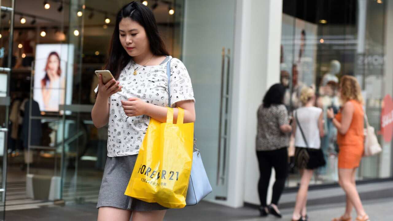 Shoppers in Queen Street mall in Brisbane