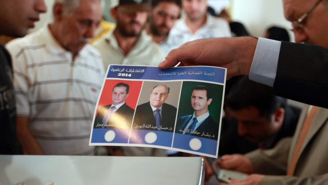 Hassan al-Nouri (middle) is one of three candidates running for presidency in Syria