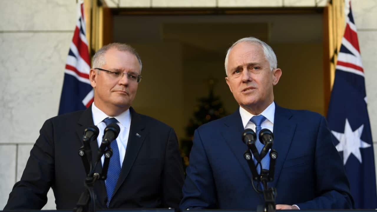 Australian Prime Minister Malcolm Turnbull (right) and Australian Treasurer Scott Morrison speak during a press conference at Parliament House in Canberra, Thursday, November 30, 2017. (AAP Image/Lukas Coch) NO ARCHIVING