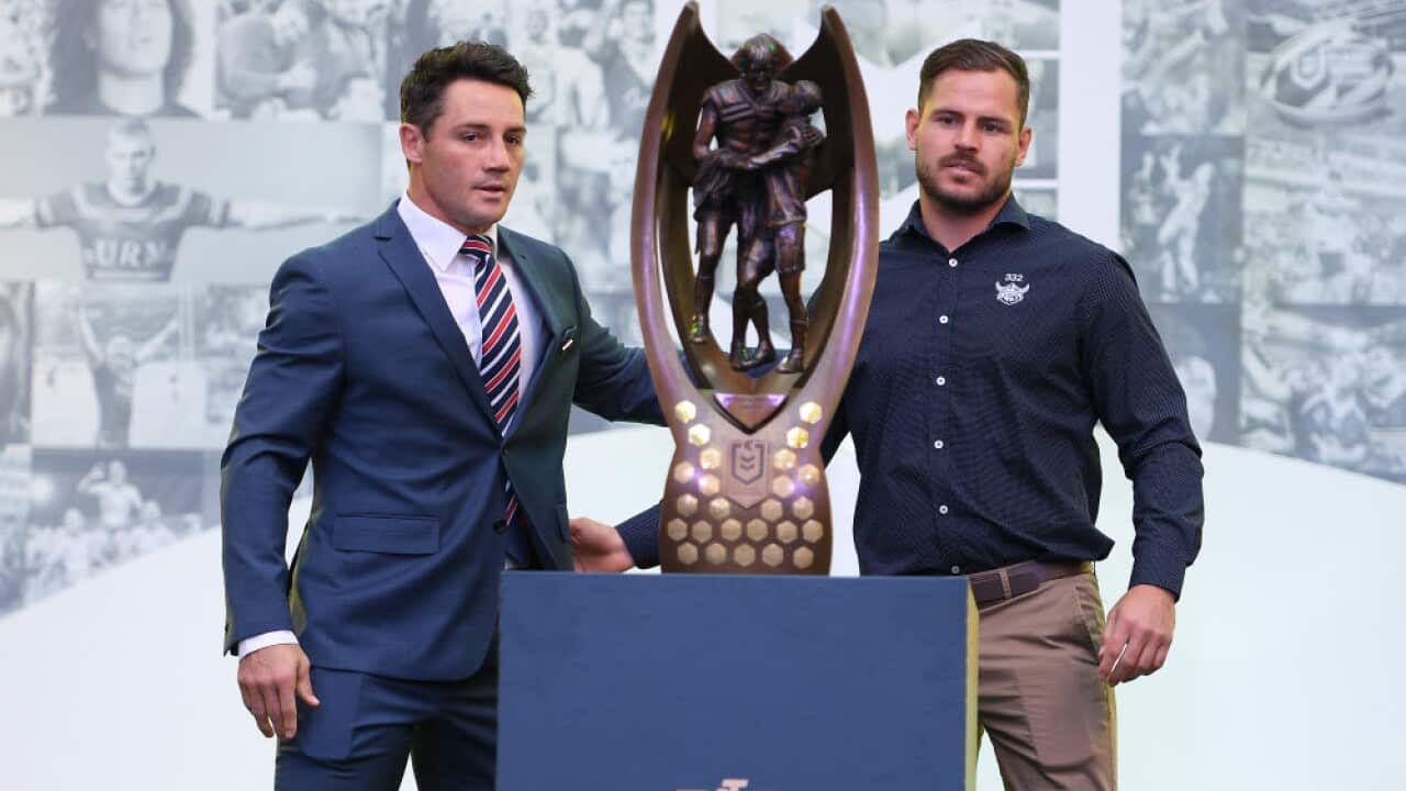 Cooper Cronk of the Sydney Roosters and Aiden Sezer of the Canberra Raiders
