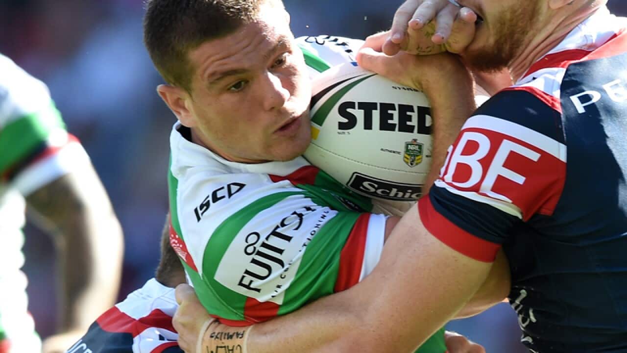 Paul Carter (centre) of the Rabbitohs