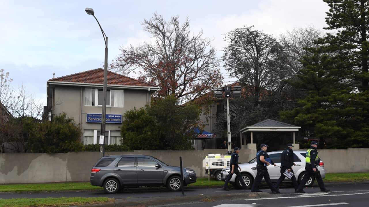 Police officers outside the Buckingham Serviced Apartments in Brighton