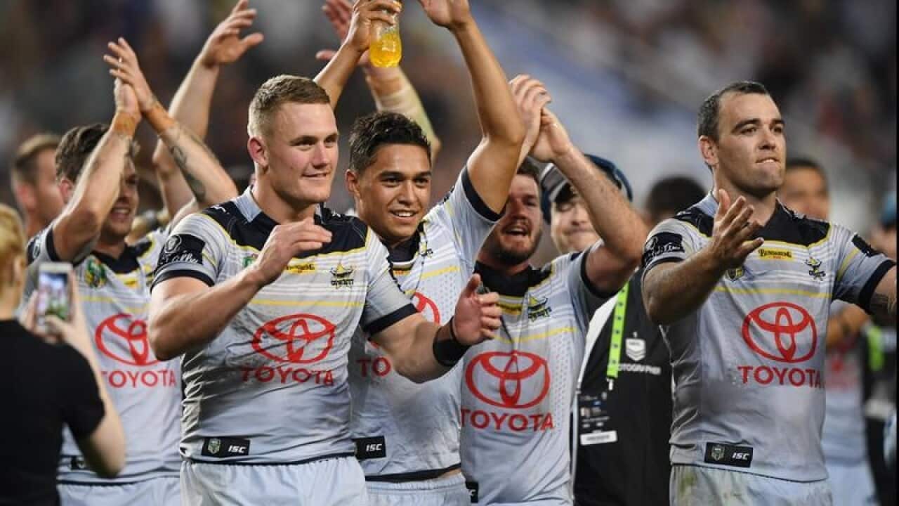 Cowboys players celebrate their NRL preliminary final win