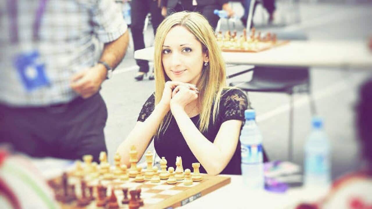 A woman boycotts a chess competition over hijab rule