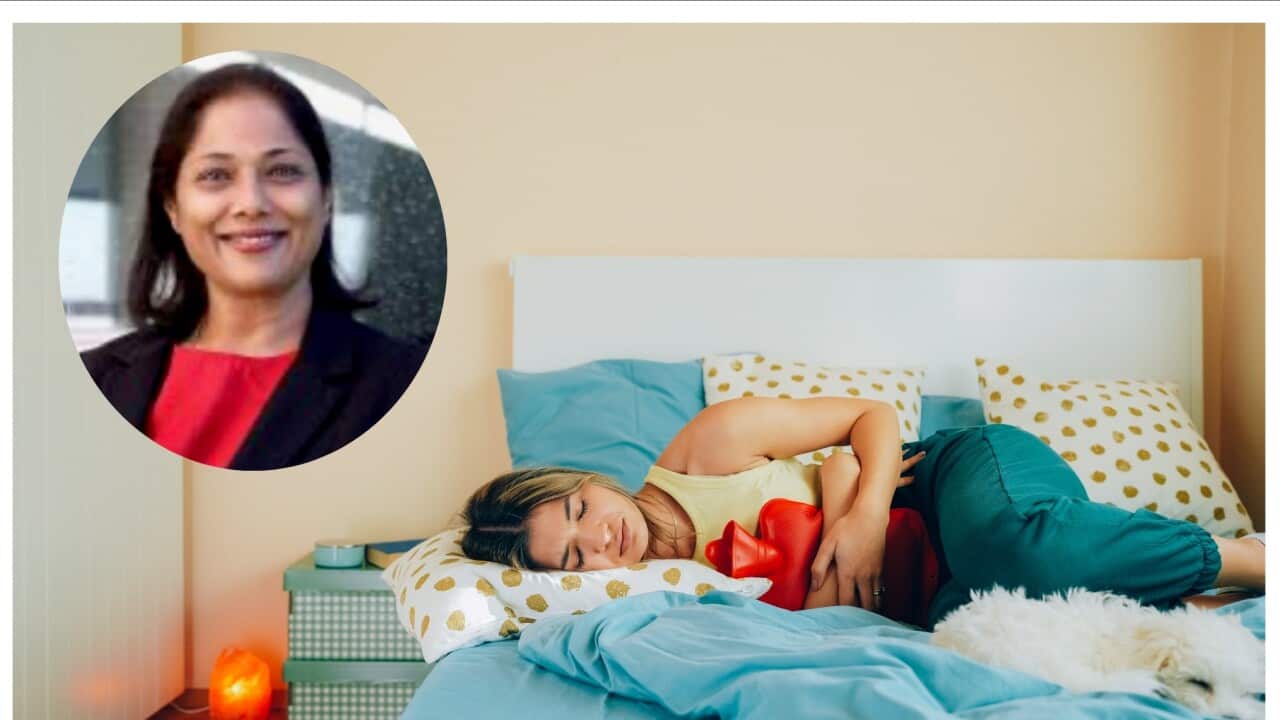 Young woman with painful menstruation resting in bed