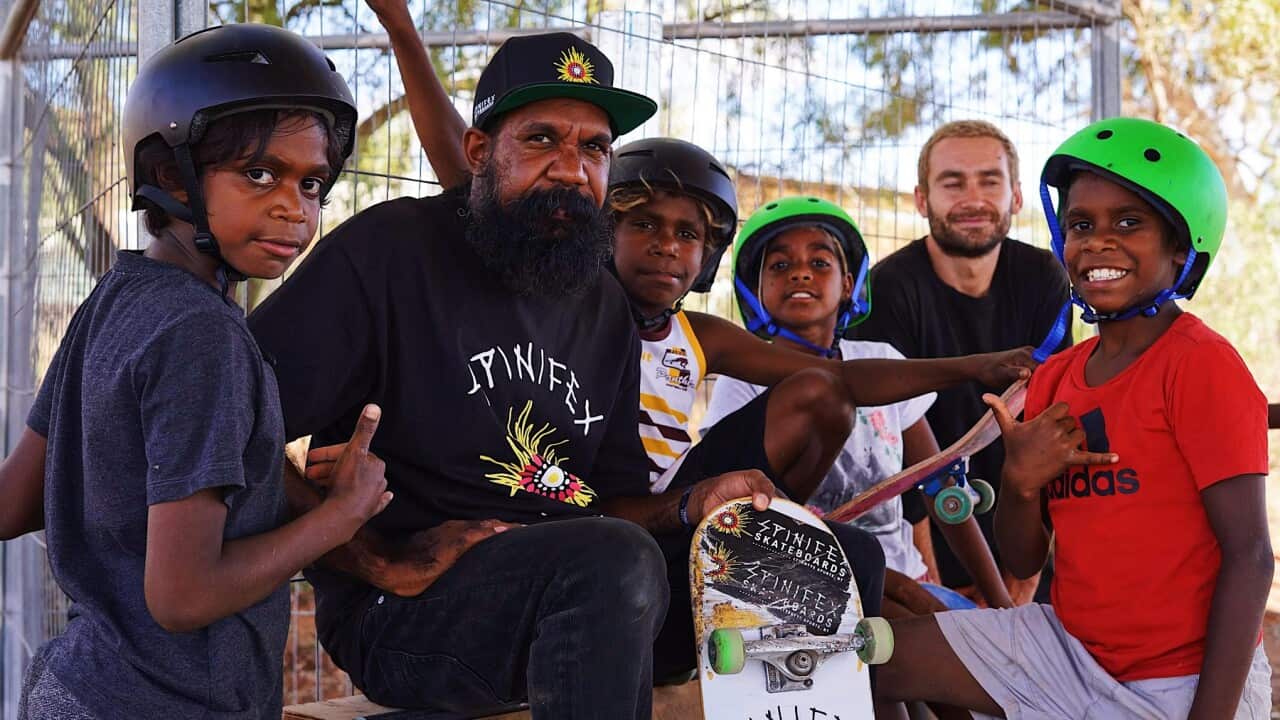 Nicky Hayes and some of his young skateboarders
