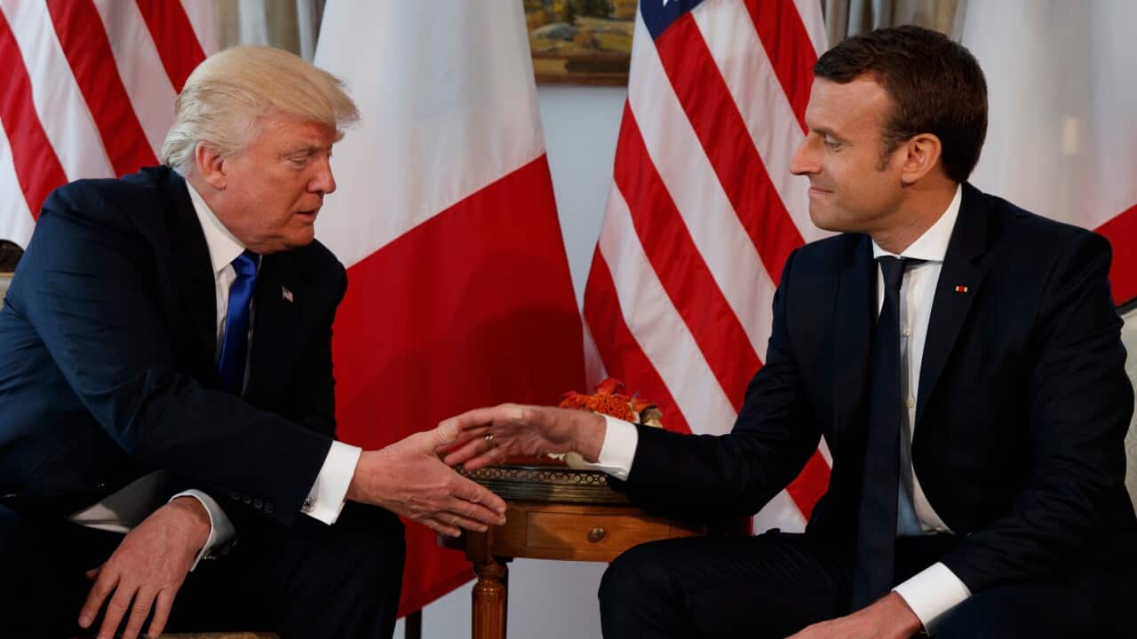 President, Donald Trump, shakes hands with French President, Emmanuel Macron, during a meeting at the U.S. Embassy in Brussels.