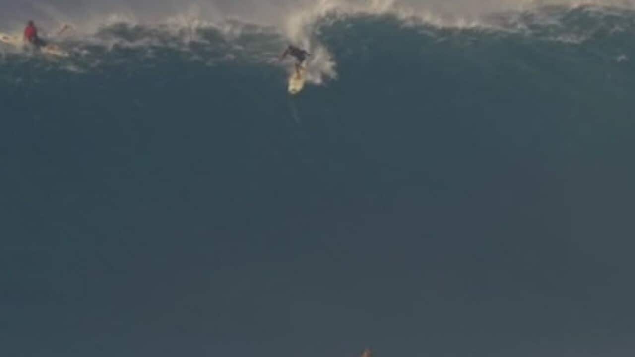 Pro surfer Tom Dosland goes over the top. (Instagram)