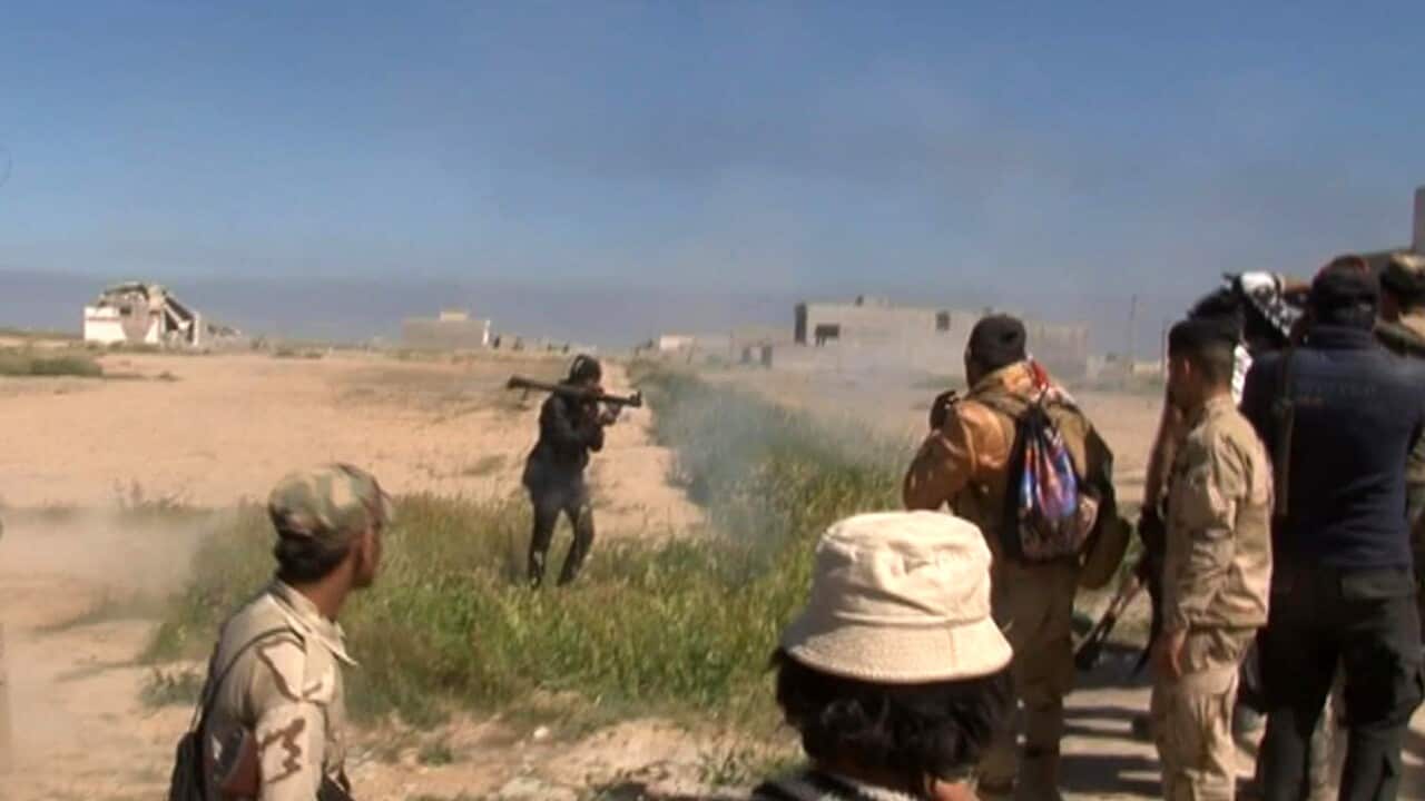 In this still image taken from video a soldier fires a rocket propelled grenade in Tikrit, Iraq on March 11, 2015. (AP)
