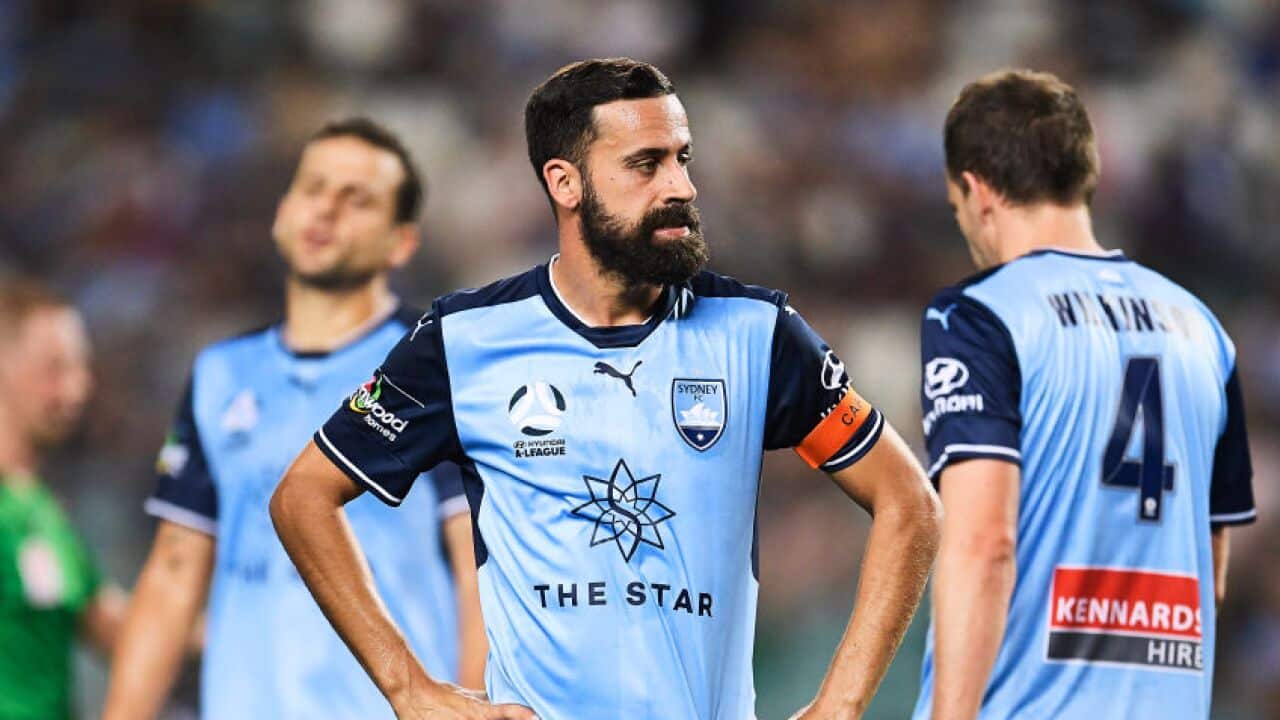 Alex Brosque reacts after Sydney FC's defeat