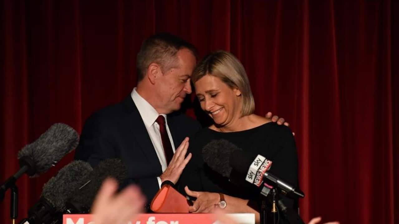 Bill Shorten helps Susan Lamb celebrate her win in Longman.