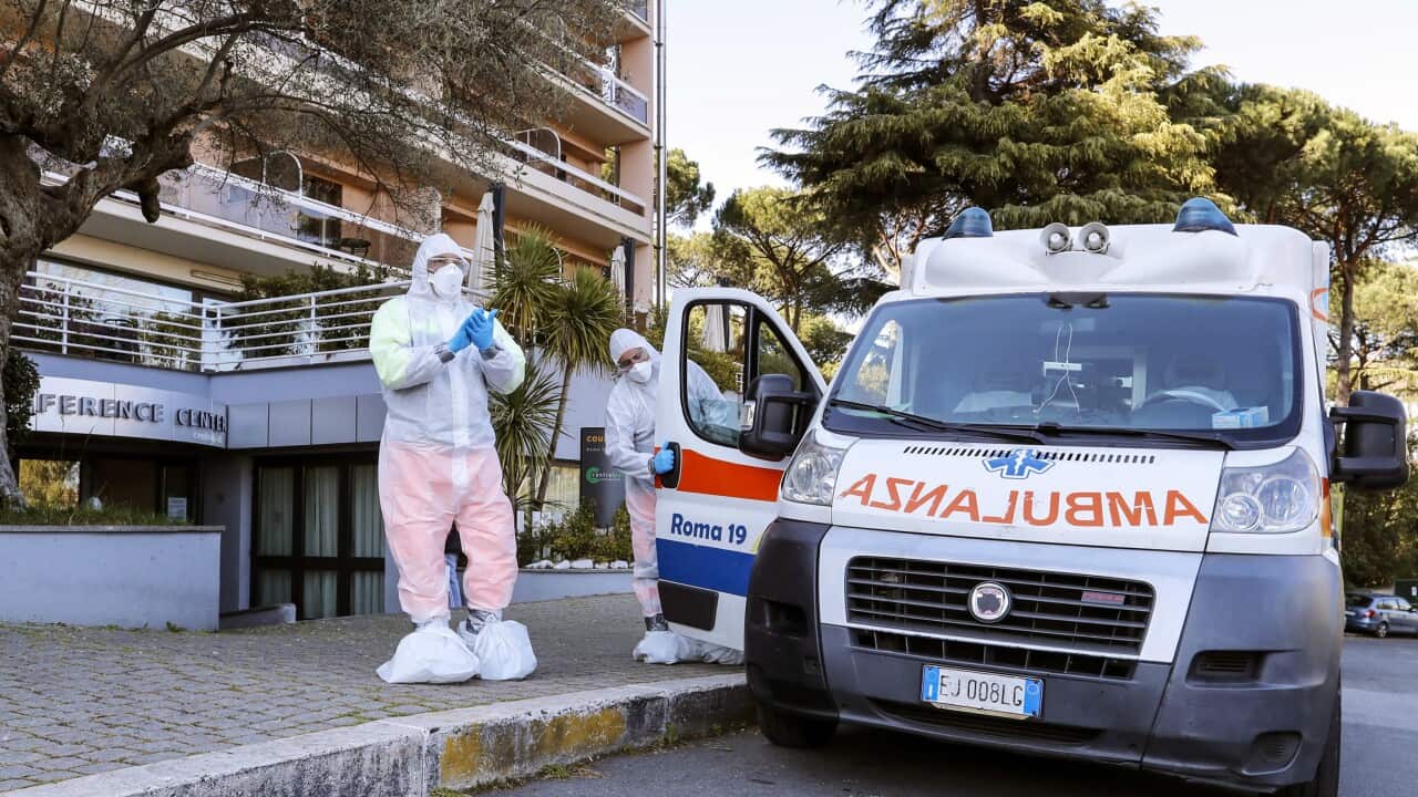 A general view of health workers outside the premises of the Courtyard hotel by Marriott Rome Central Park