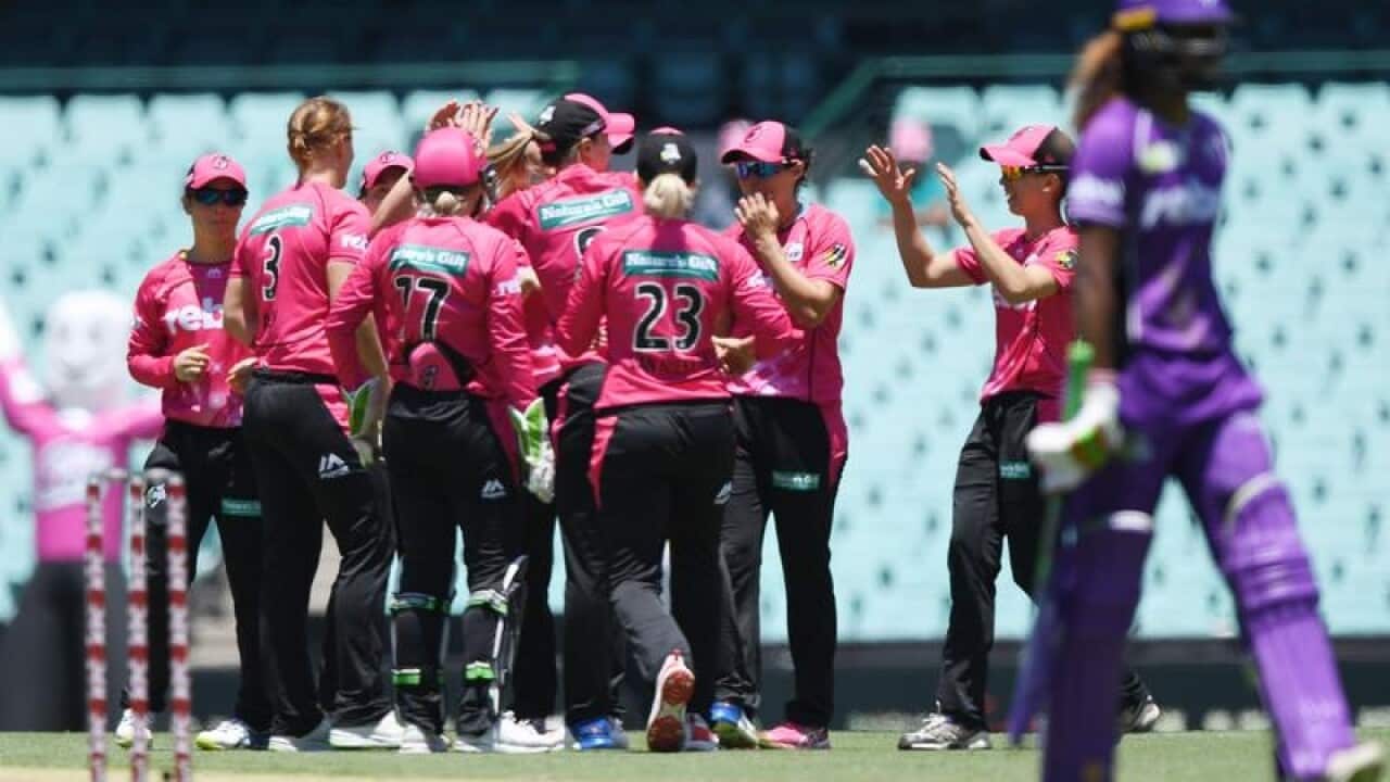 Sydney Sixers players celebrate