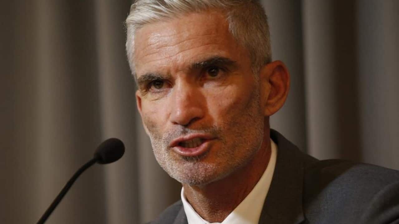 Craig Foster talks to journalists in Thailand.