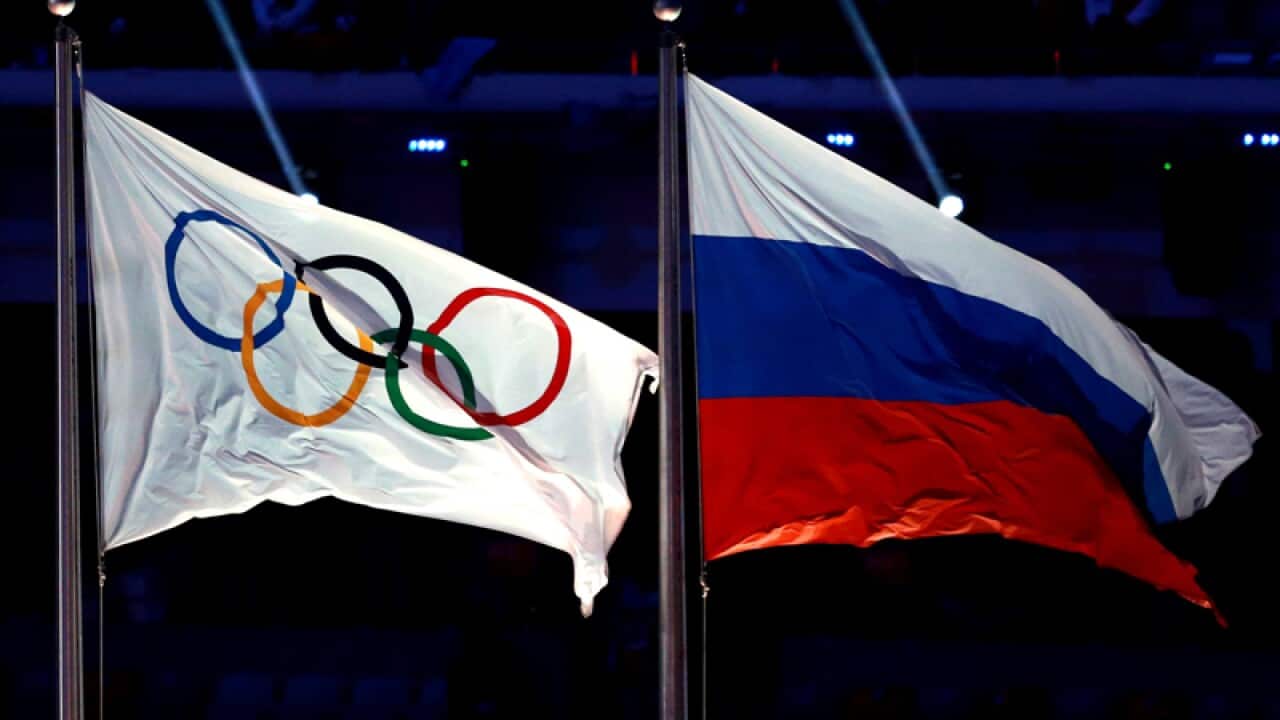 An Olympic and Russian flag