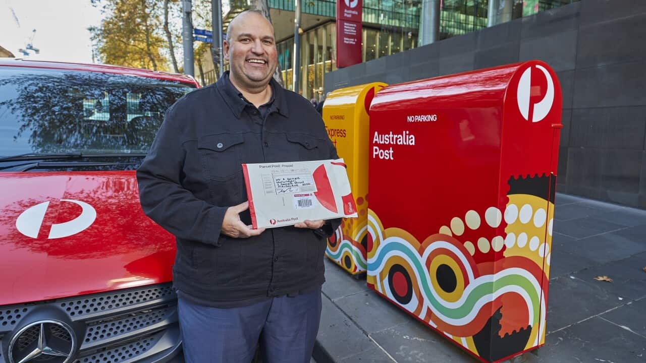 Australia Post Indigenous Manager Chris Heelan with the new packaging.